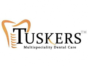 Tuskers Multispeciality Dental Care logo